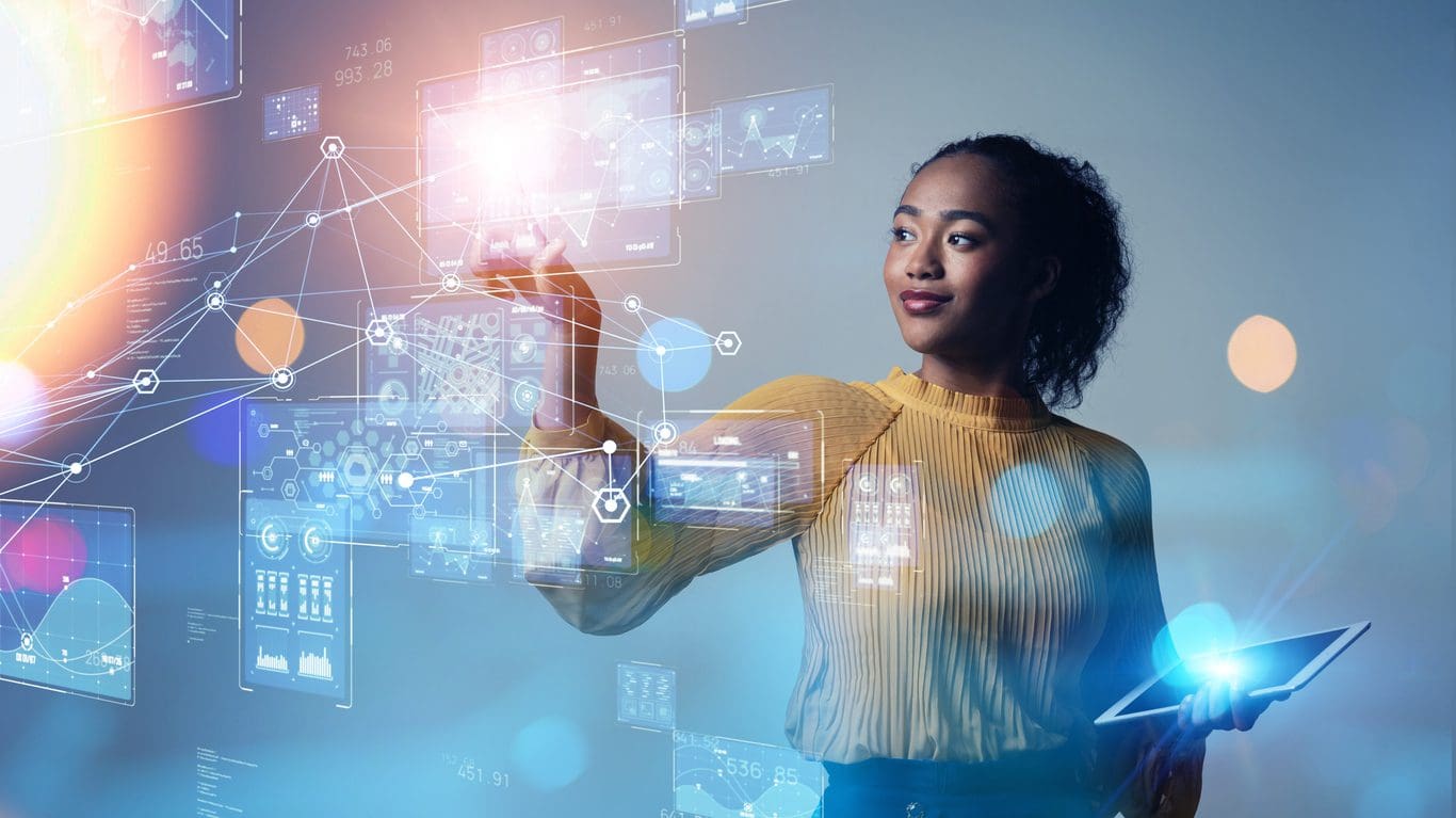 Woman writing on digital whiteboard with numbers and figures