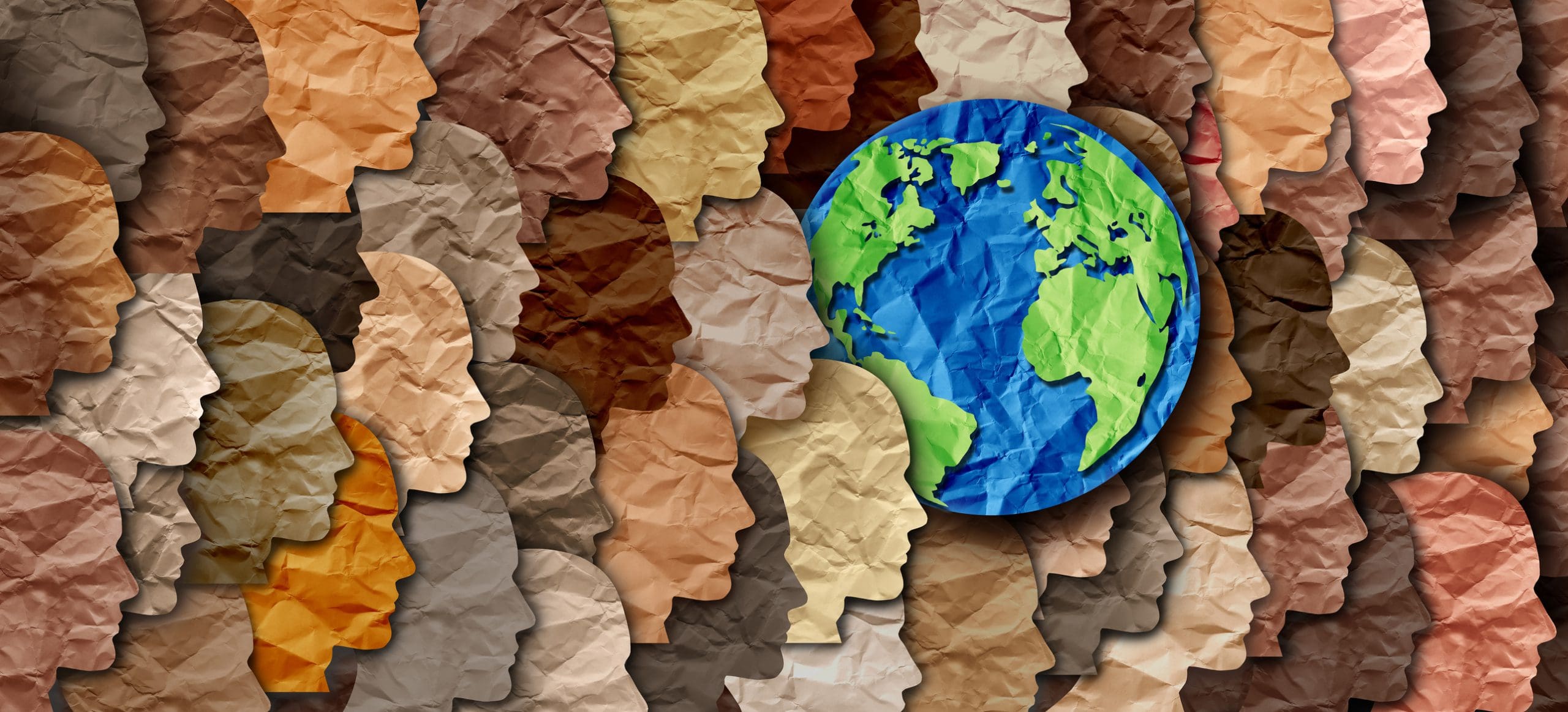 Collage of globe in a background of multiracial faces.