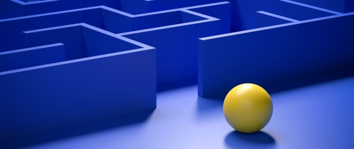 Concept - solving a complex problem. Blue maze and floor with yellow sphere at the entrance / exit.